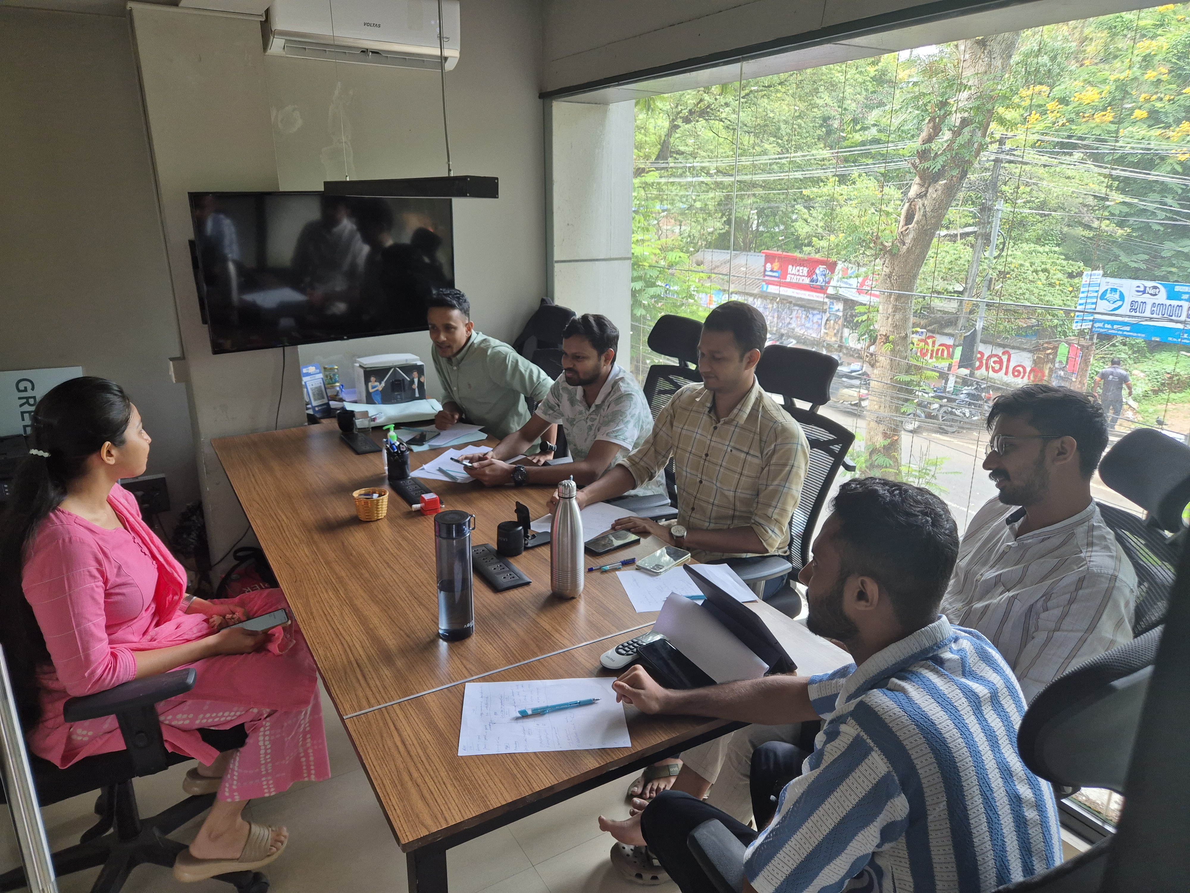 A mentor reviewing a student’s UPSC mock test answer sheet for personalized feedback