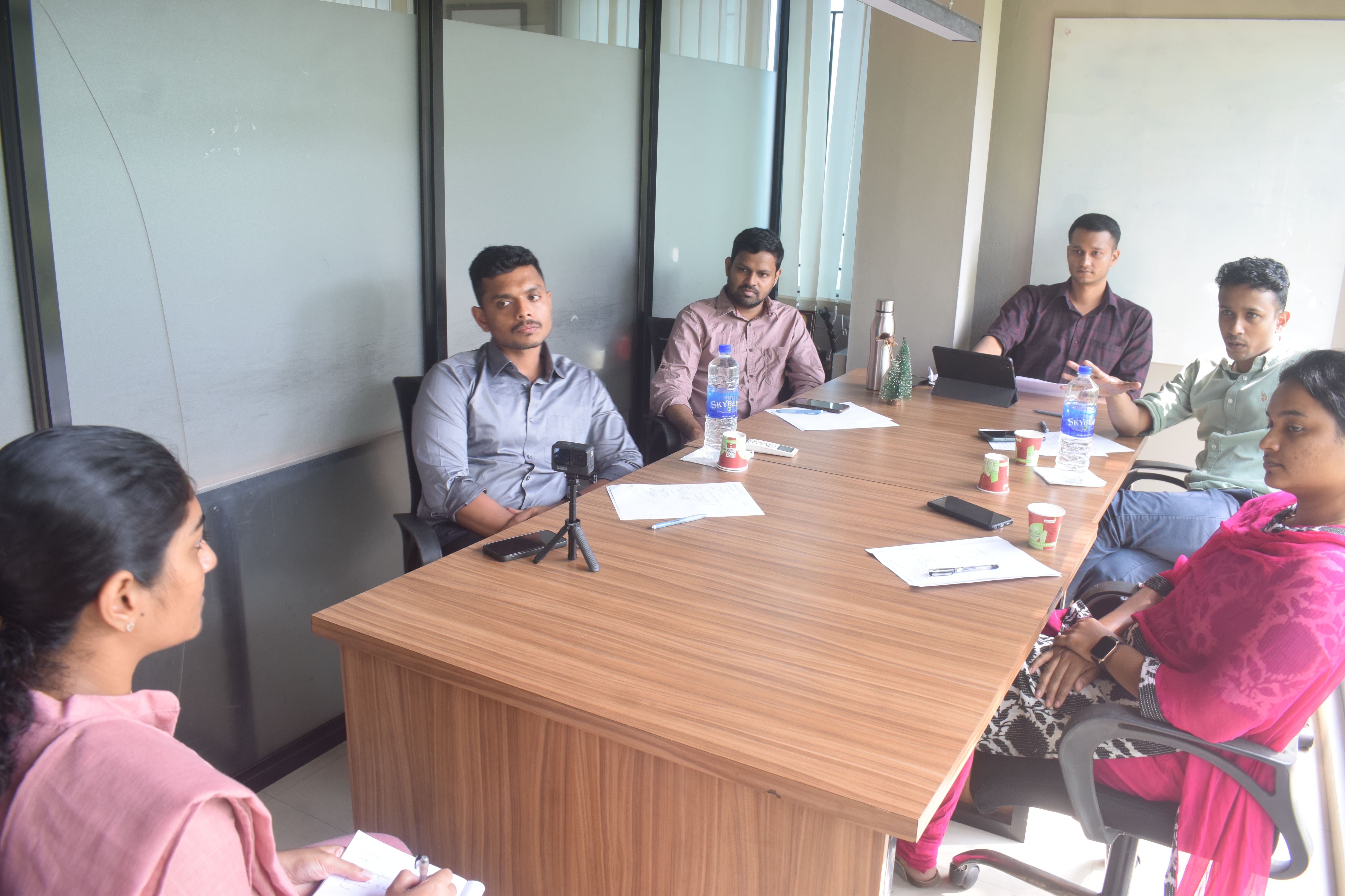 A mentor reviewing a student’s UPSC mock test answer sheet for personalized feedback